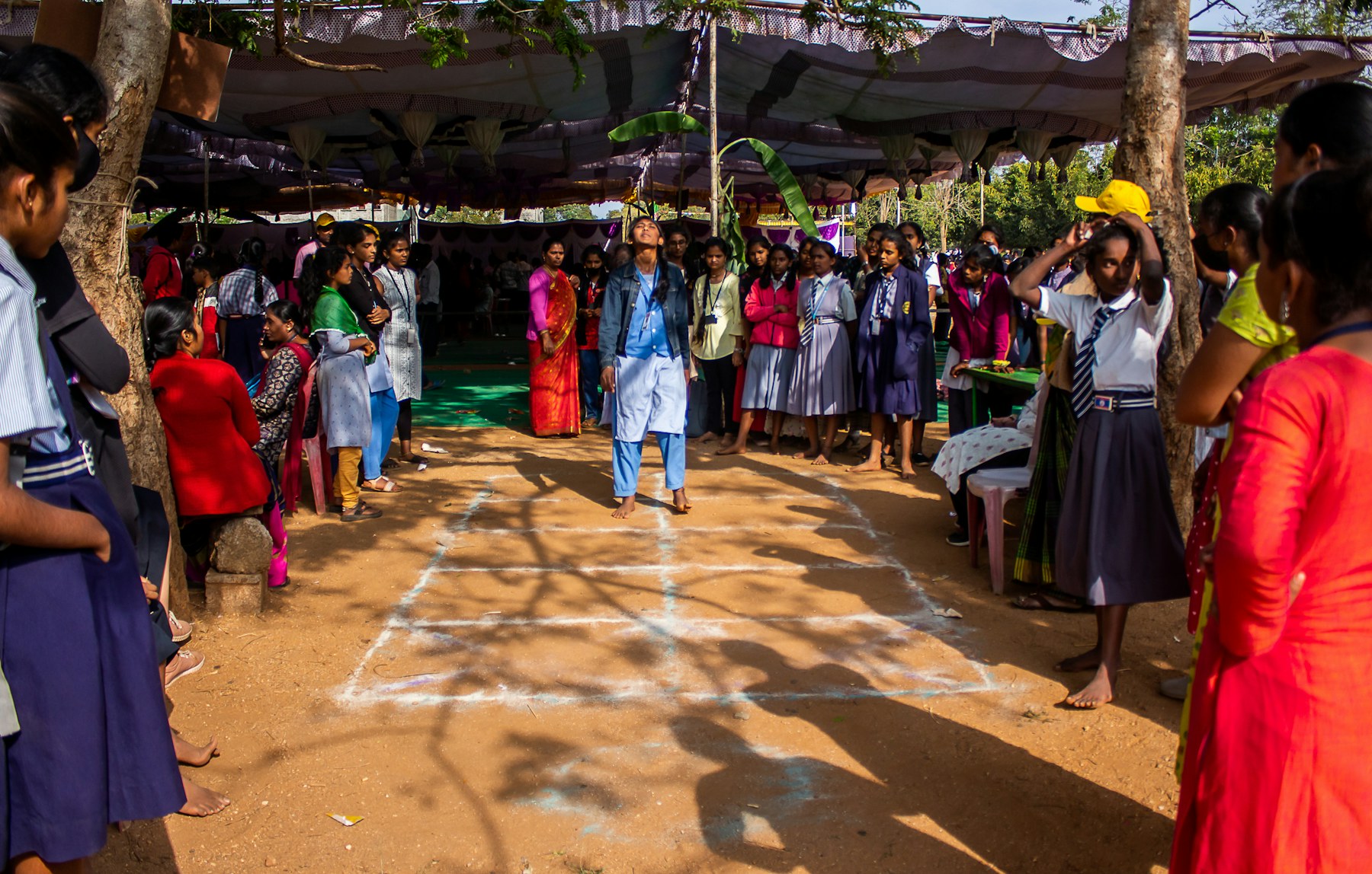 Students take part in an outdoor group game.
